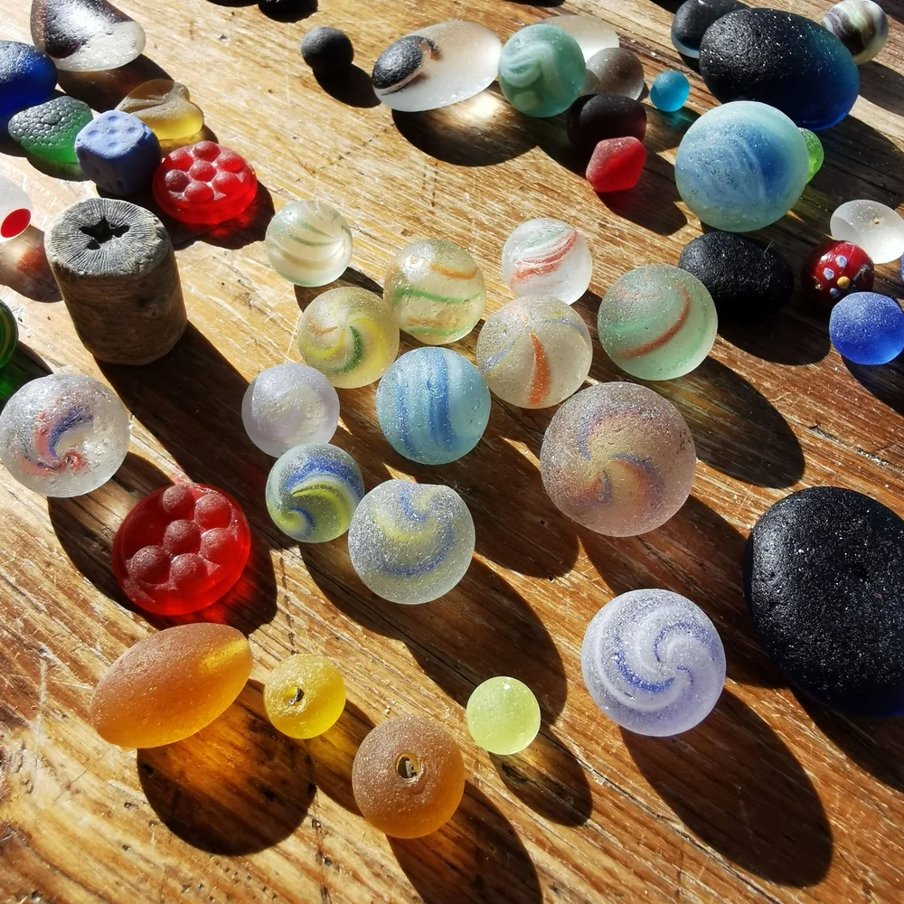 Beachcombing find: 23 Marbles Beads Hatpins Lenses